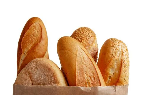 A paper bag with bread on white background. Stock Photos