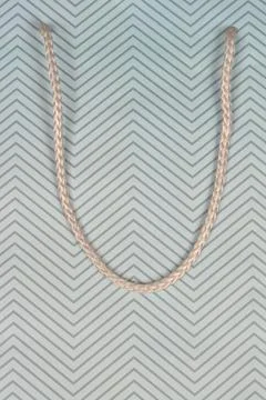 Paper Bag with Chevron Pattern and Rope Handle Foto stock