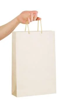 Paper bag in hand Stock Photos