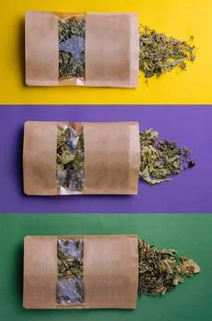 Paper bags with scattered different dried tea Stock Photos