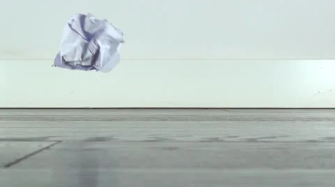 Paper ball on floor Stock Footage 24898511