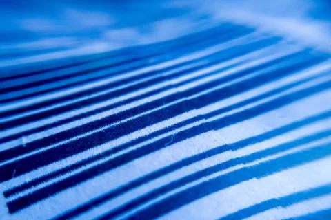Paper bar code close up macro shot on blue tone . 写真素材