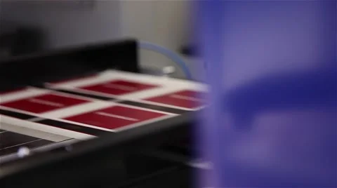 Paper being printed in a printing press, slider shot Stock Footage 57284843