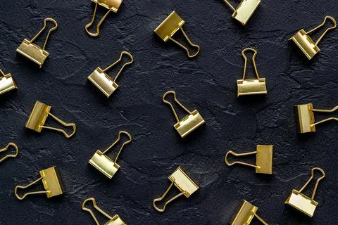 Paper binder clips pattern, copy space. Office supplies background Stock Photos