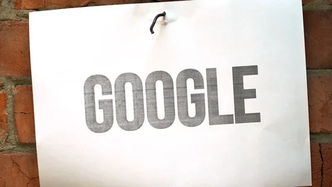 The paper with the black word Google burn, smoke. The concept of trade war. Stock Footage 108756345