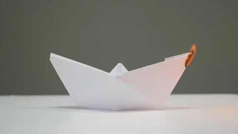 Paper boat is on fire. time lapse Stock Footage 163717525