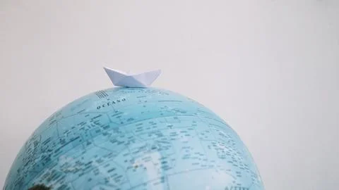 Paper boat globe Stock Photos