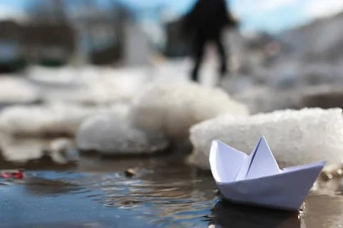Paper boat in a pool various objects of the spring season in the best of t... 스톡 사진