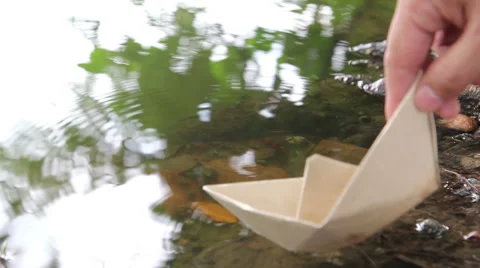 Paper boat on the river Stock Footage 53101380