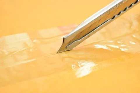 Paper box packaging with sharp knife, packaging industry Foto stock