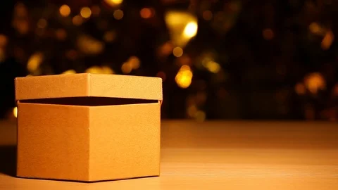 Paper box table dark background hd footage Stock Footage 121325386