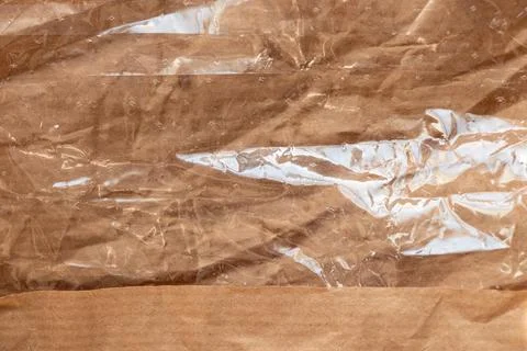 Paper bread packaging with a clear polyethylene insert and vents for food p.. Stock Photos