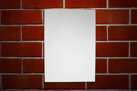 Paper on brickwall Stock Photos