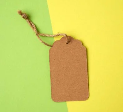 Paper brown rectangular price tag on a rope 写真素材