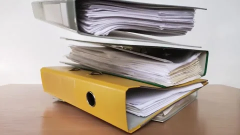 Paper business documents fall on the office desk Stock Footage 286101590