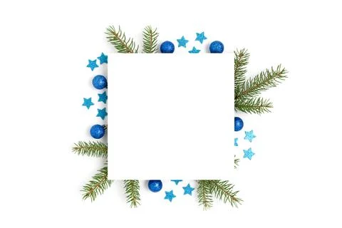 Paper card template with frame made of blue Christmas toys. Stock Photos