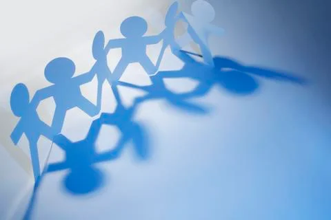 Paper chain people Stock Photos