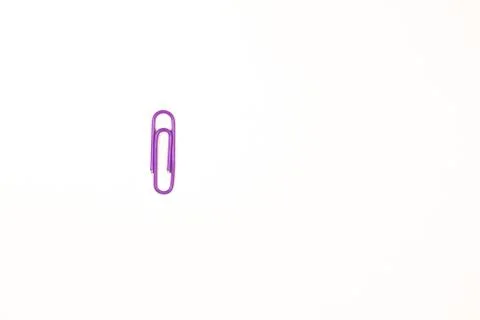Paper clip on a white background Stock Photos