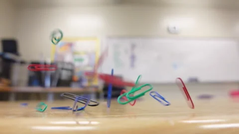 Paper Clips Falling on Table| Slow Motion 120 Fps Stock Footage 199661054