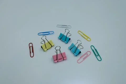 Paper clips multicolor on white background Stock Photos