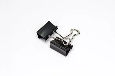 Paper clips on white background. Stock Photos