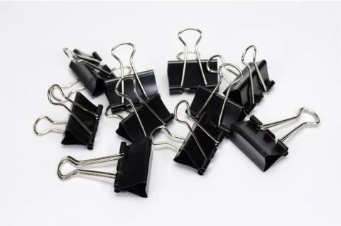 Paper clips on white background. Foto stock