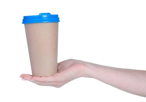Paper coffee cup in hand Stock Photos