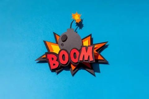 Paper comic speech bubble on blue background. Boom. Bomb. Stock Illustration