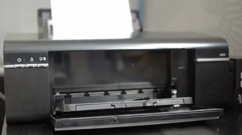 A paper coming out of a printer Stock Footage 50068115