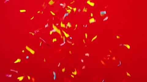 Paper confetti on a red background. Stock Footage 108278578
