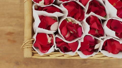 Paper cornets with rose petals Stock Footage 56058136