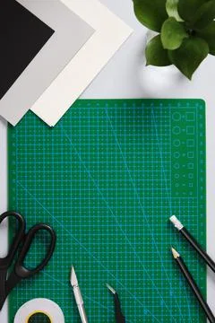 Paper crafting tools: scissors, craft knife, pencil, tweezers, eraser, cutt.. Stock Photos