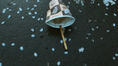 Paper cup on the asphalt Stock Footage 49354640