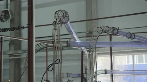 Paper cups are moved to packing area by pneumatic mail. Stock Footage 156719014