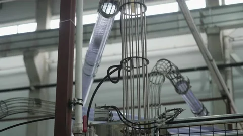 Paper cups are moved to packing area by pneumatic mail. Stock Footage 156719016
