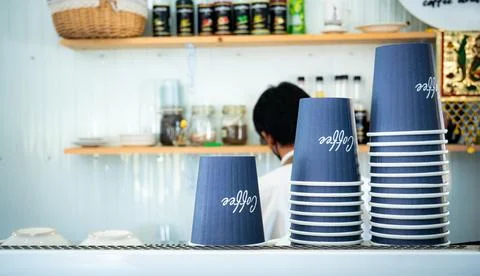 Paper cups or plastic cups for coffee one time use stacked upside down On t.. Stock Photos