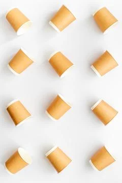 Paper cups pattern. Take away coffee or tea cups, top view Stock Photos