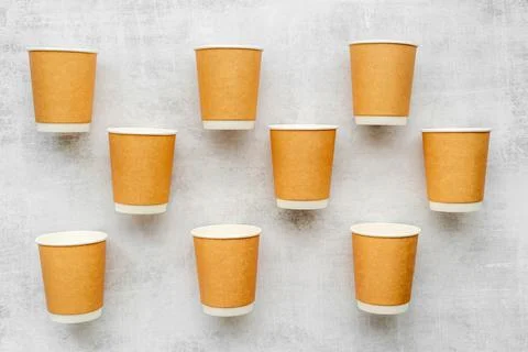 Paper cups pattern. Take away coffee or tea cups, top view Stock Photos