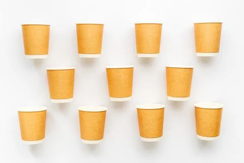 Paper cups pattern. Take away coffee or tea cups, top view Stock Photos