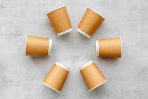 Paper cups pattern. Take away coffee or tea cups, top view Stock Photos