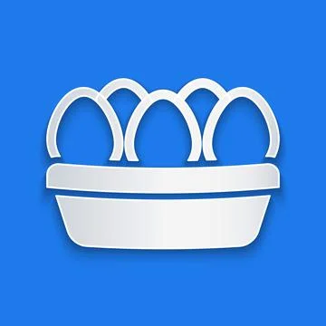 Paper cut Chicken egg in box icon isolated on blue background. Paper art style Illustrazione stock