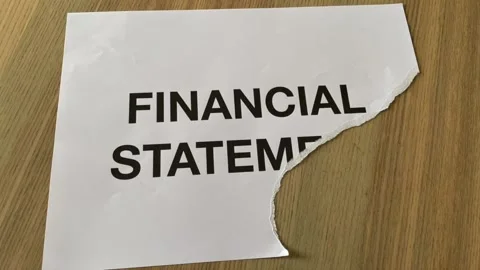 Paper cut into pieces in stop motion printed "FINANCIAL STATEMENT" word Stock Footage 172289215