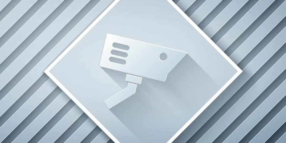 Paper cut Security camera icon isolated on grey background. Paper art style Stock Illustration