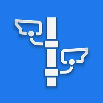 Paper cut Security camera icon isolated on blue background. Paper art style.  Illustrazione stock