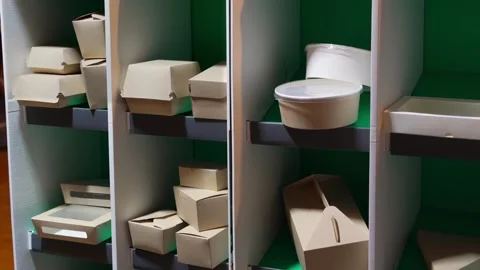 Paper eco-friendly disposable tableware. A large set of dishes and packaging for Stock Footage 307849913