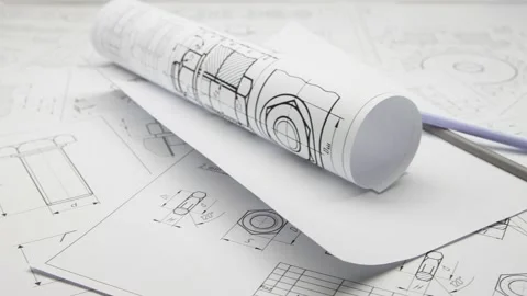 Paper engineering drawings of hardware and pencils. Design engineer project. Stock Footage 147946117