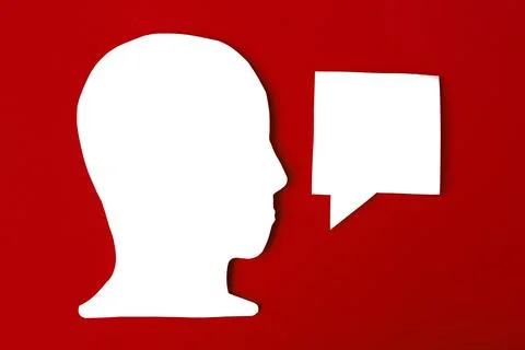 Paper face and speech bubble on colorbackground copy space for text, communic Stock Photos