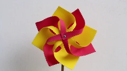 Paper fan is spinning Stock Footage 72975329
