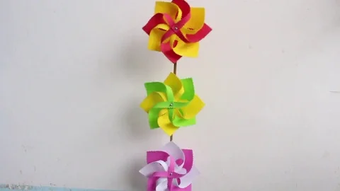 Paper fan is spinning Stock Footage 72975361