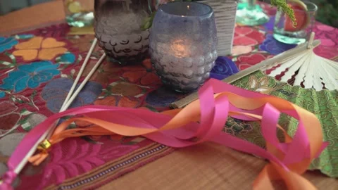 Paper fan on a table - party Stock Footage 191290553